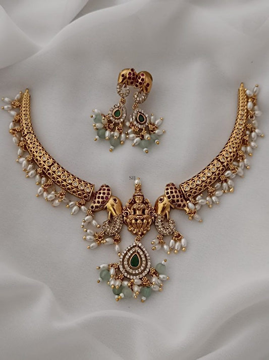 Antique Temple Peacock Lakshmi Necklace Set with Green Stone & Pearl Drops